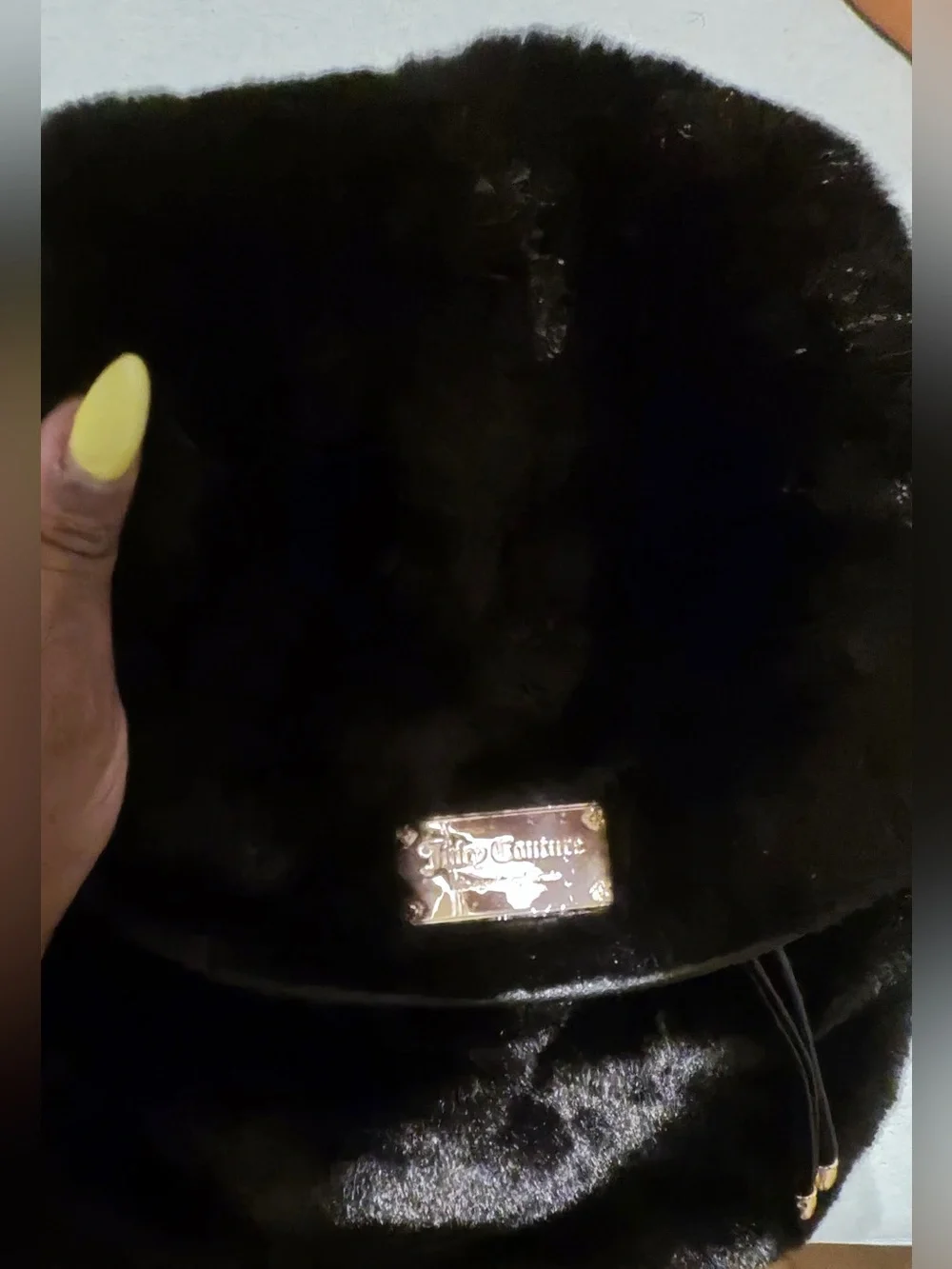 Juicy Couture Dreamy Divas black faux fur backpack with drawstring closure